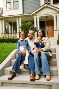 Family Sitting on Front Steps